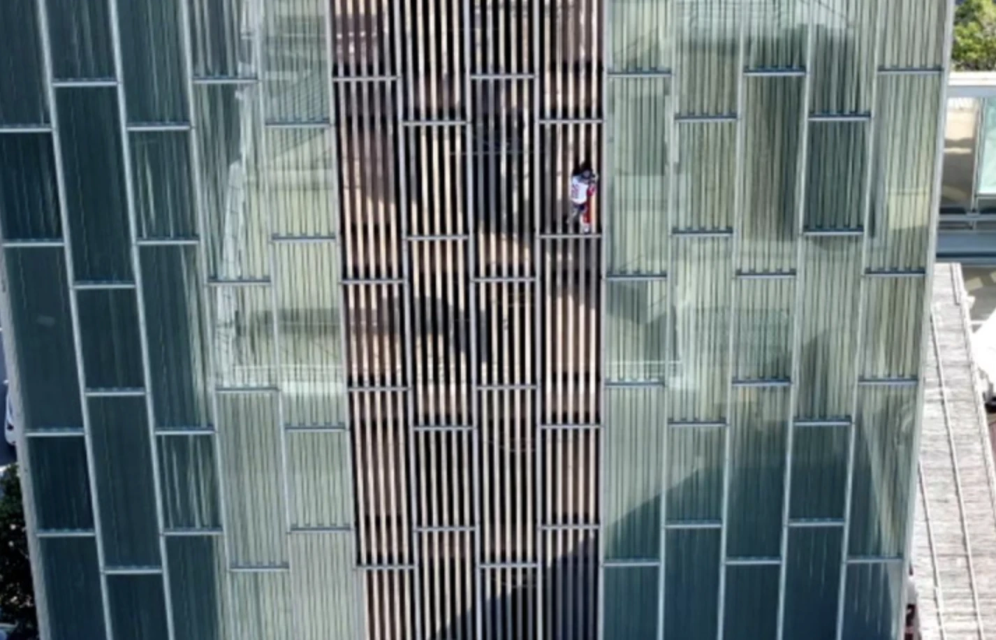 French Spider-Man climbs skyscraper with bare hands and releases extreme sports token Tigershark