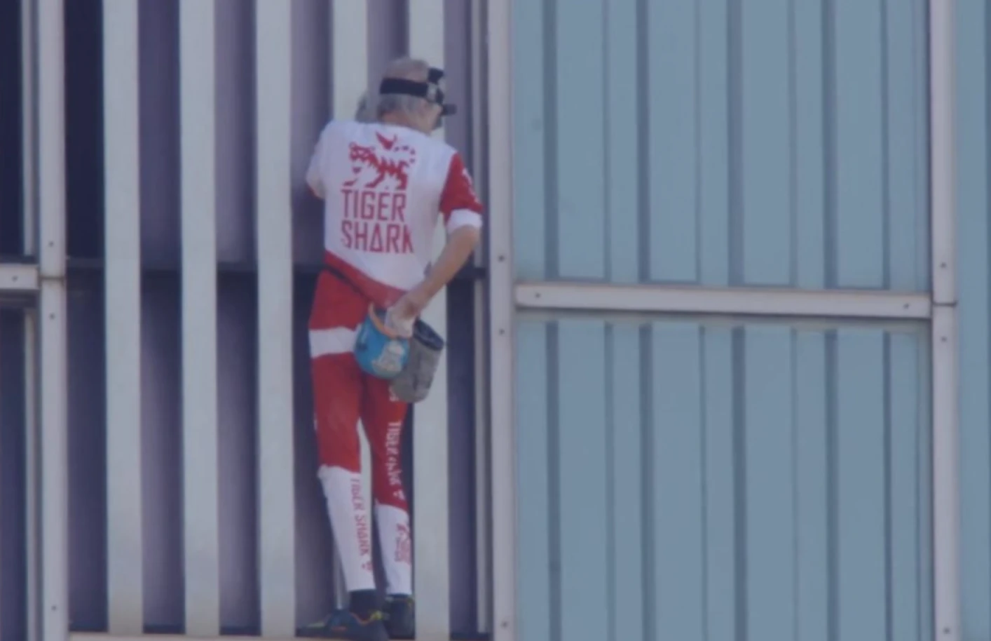 French Spider-Man climbs skyscraper with bare hands and releases extreme sports token Tigershark
